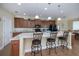 Kitchen with an island, granite countertops, and stainless steel appliances at 8626 Agate St, Port Charlotte, FL 33981