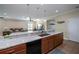 Kitchen island with granite countertops and a large sink at 8626 Agate St, Port Charlotte, FL 33981