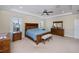 Spacious main bedroom with a king-size bed, and plenty of natural light at 8626 Agate St, Port Charlotte, FL 33981