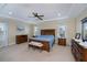 Spacious main bedroom with a king-size bed, and plenty of natural light at 8626 Agate St, Port Charlotte, FL 33981