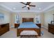 Spacious main bedroom with a king-size bed, and plenty of natural light at 8626 Agate St, Port Charlotte, FL 33981