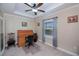 Home office with built-in desk and plenty of natural light at 8626 Agate St, Port Charlotte, FL 33981