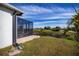 Screened patio area with a view of the canal at 8626 Agate St, Port Charlotte, FL 33981