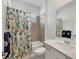 Bathroom with tub shower combination at 8746 Saint Kitts Cir, Englewood, FL 34224