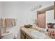 Clean bathroom with vanity and shower at 9000 Griggs Rd # G, Englewood, FL 34224