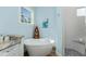 Bathroom with a freestanding soaking tub and walk-in shower at 9240 Pine Cove Dr, Englewood, FL 34224