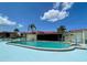 Sparkling community pool with a relaxing atmosphere at 93 Boundary Blvd # 301, Rotonda West, FL 33947