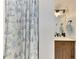 Updated bathroom with a wooden vanity at 1 Quails Run Blvd # 5, Englewood, FL 34223