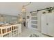 Condo dining area with view into the living room and kitchen at 1 Quails Run Blvd # 5, Englewood, FL 34223