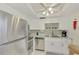 Updated kitchen, featuring stainless steel appliances and granite countertops at 1 Quails Run Blvd # 5, Englewood, FL 34223