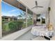 Screened lanai overlooking the canal at 1 Quails Run Blvd # 5, Englewood, FL 34223