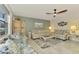 Spacious living room with comfortable seating and coastal decor at 1 Quails Run Blvd # 5, Englewood, FL 34223