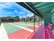 Covered shuffleboard courts with benches at 1 Quails Run Blvd # 5, Englewood, FL 34223