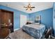Bedroom with nautical-themed bedding and a wooden bookcase at 11247 Euler Ave, Englewood, FL 34224