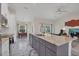 Modern kitchen with stainless steel appliances and granite countertops at 11247 Euler Ave, Englewood, FL 34224
