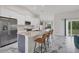 Modern kitchen with stainless steel appliances and granite countertops at 11247 Euler Ave, Englewood, FL 34224