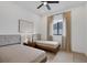 Bright bedroom with two twin beds, neutral decor, and plenty of natural light at 1169 Boundary Blvd, Rotonda West, FL 33947