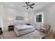 Comfortable main bedroom with a king-size bed and a ceiling fan at 1169 Boundary Blvd, Rotonda West, FL 33947