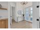 Bright entryway with a modern console table and mirror at 1169 Boundary Blvd, Rotonda West, FL 33947