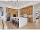 Modern kitchen features white countertops and wood cabinets at 1169 Boundary Blvd, Rotonda West, FL 33947