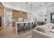 Modern kitchen with an island, breakfast bar, and wood cabinets at 1169 Boundary Blvd, Rotonda West, FL 33947