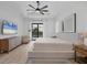 Spacious main bedroom with a king-size bed and access to the pool at 1169 Boundary Blvd, Rotonda West, FL 33947