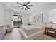 Bright bedroom with large windows and access to a pool view at 1169 Boundary Blvd, Rotonda West, FL 33947