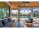 Covered patio overlooking a refreshing pool and a spacious backyard at 1169 Boundary Blvd, Rotonda West, FL 33947