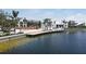 Community clubhouse and waterfront views at 12390 Wellen Golf St # 108, Venice, FL 34293