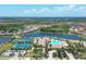 Aerial view of community pool, tennis courts at 12580 Ghiberti Cir # 101, Venice, FL 34293