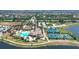 Resort-style community pool, clubhouse, and tennis courts at 12580 Ghiberti Cir # 101, Venice, FL 34293