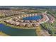 Aerial view of upscale community with lake at 12580 Ghiberti Cir # 101, Venice, FL 34293