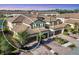 Aerial view of a beautiful townhome community nestled near a lake at 12580 Ghiberti Cir # 101, Venice, FL 34293