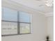 Bright bedroom with large window and blinds at 12580 Ghiberti Cir # 101, Venice, FL 34293