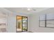 Bright bedroom with sliding glass doors to a patio at 12580 Ghiberti Cir # 101, Venice, FL 34293