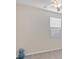 Simple bedroom with a closet and window with blinds at 12580 Ghiberti Cir # 101, Venice, FL 34293