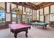 Community game room with two pool tables at 12580 Ghiberti Cir # 101, Venice, FL 34293
