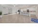 Open concept kitchen with stainless steel appliances and island at 12580 Ghiberti Cir # 101, Venice, FL 34293