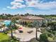 Aerial view of resort-style pool and clubhouse at 12580 Ghiberti Cir # 101, Venice, FL 34293