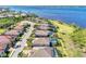 Aerial view of community, highlighting homes and water access at 12953 N Marsh Dr, Port Charlotte, FL 33953