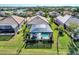 Aerial view of home showcasing backyard pool at 12953 N Marsh Dr, Port Charlotte, FL 33953