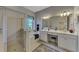 Double vanity bathroom with soaking tub and shower at 12953 N Marsh Dr, Port Charlotte, FL 33953