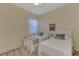 Bedroom with two twin beds and white headboards at 12953 N Marsh Dr, Port Charlotte, FL 33953
