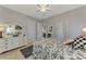 Spacious bedroom with white dresser and floral bedding at 12953 N Marsh Dr, Port Charlotte, FL 33953