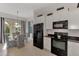 Bright kitchen features breakfast nook and glass table at 12953 N Marsh Dr, Port Charlotte, FL 33953