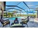 Relaxing screened pool and patio area at 12953 N Marsh Dr, Port Charlotte, FL 33953