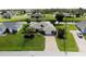 Single-Gathering home with landscaped yard and driveway at 145 Bunker Rd, Rotonda West, FL 33947