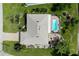 Bird's-eye view of home, pool, and backyard landscaping at 145 Bunker Rd, Rotonda West, FL 33947