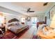 Main bedroom with king-size bed and access to patio at 145 Bunker Rd, Rotonda West, FL 33947