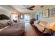 Main bedroom with king-size bed and access to patio at 145 Bunker Rd, Rotonda West, FL 33947